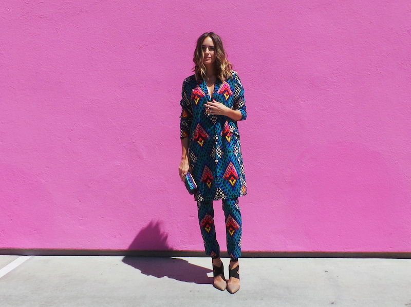 streetstyle fashion mara hoffman suit on a pink wall- via Front Roe, a fashion blog by Louise Roe