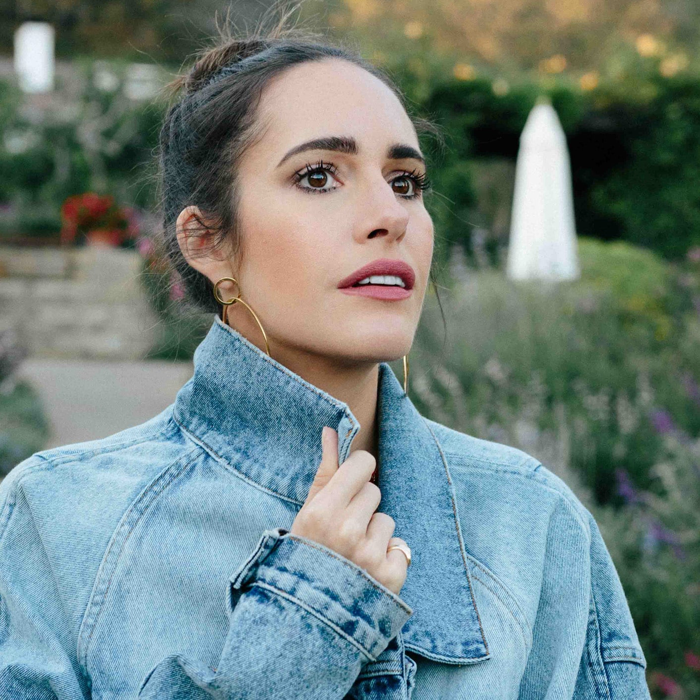 Louise Roe wearing drugstore beauty products and a denim jacket in Santa Barbara
