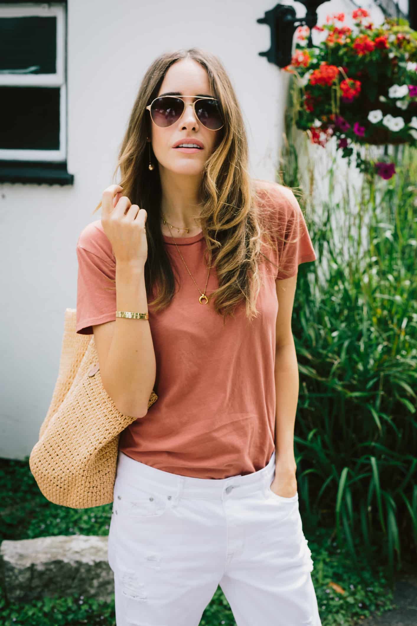 Louise Roe wearing a casual off duty style look with tee and jean