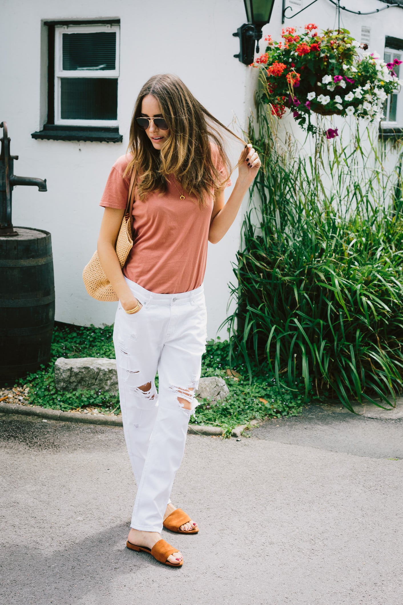 Louise Roe wearing a casual off duty style look with tee and jean