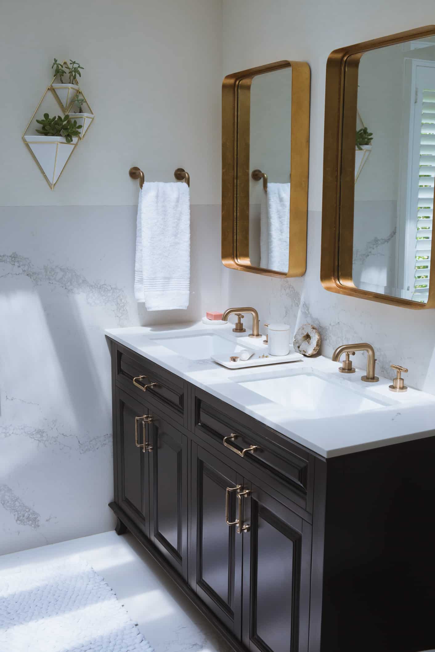 Louise Roe bathroom remodel reveal featuring gold hardware
