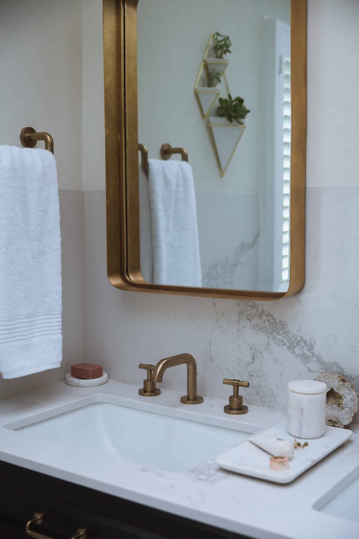 Louise Roe bathroom remodel reveal featuring gold hardware