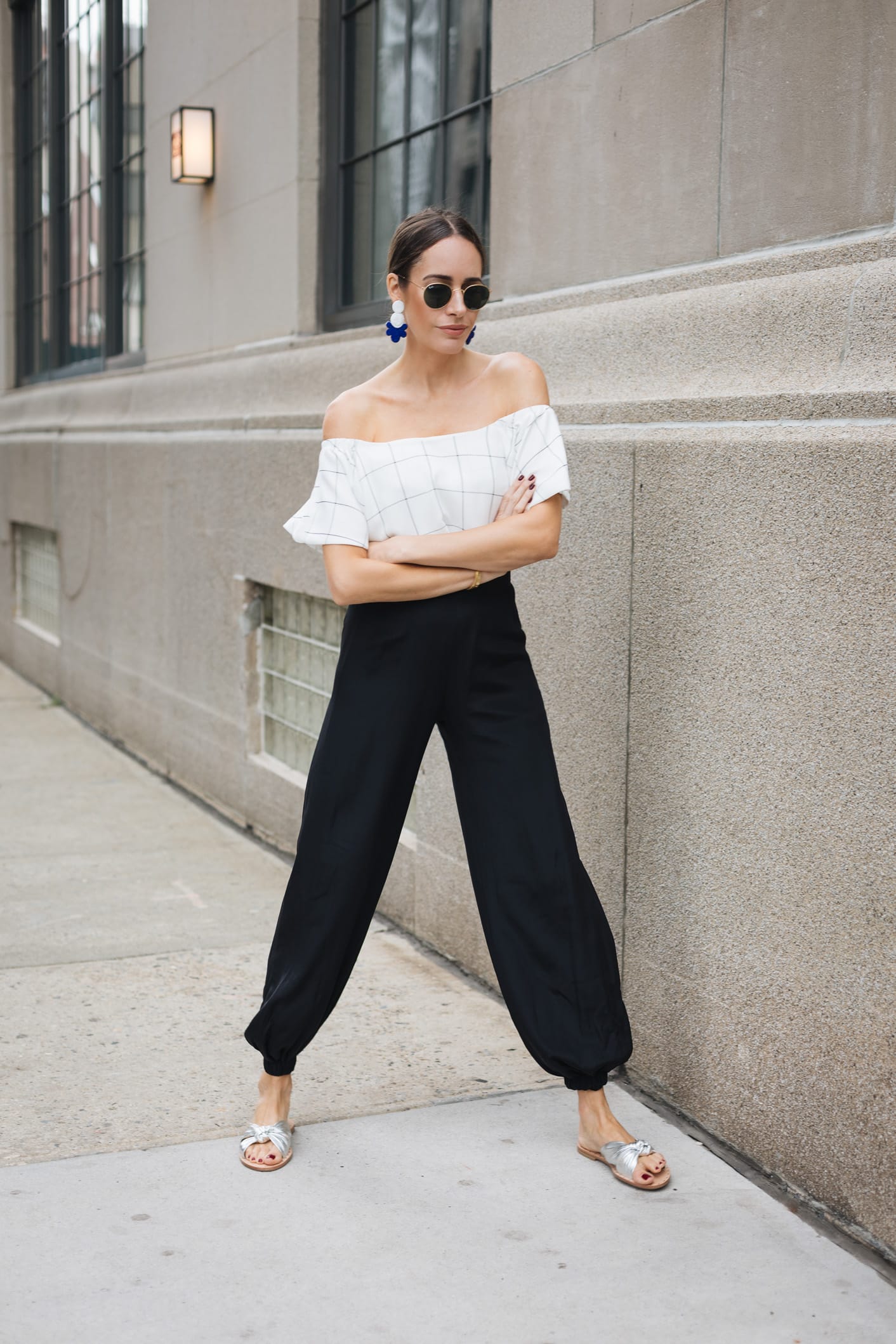 Louise Roe wearing off shoulder top in NYC