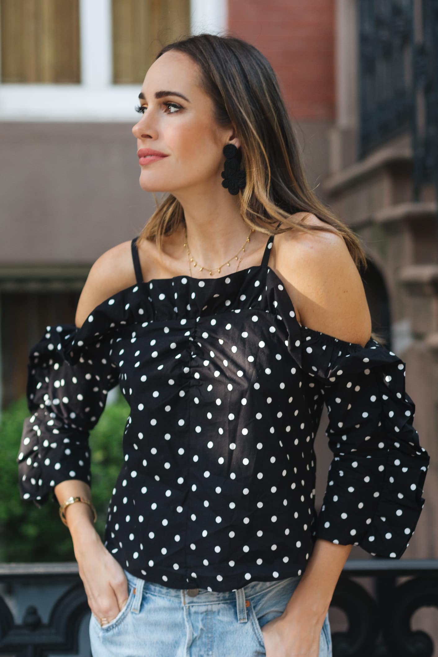 Louise Roe wearing polka dot top and mom jeans in NYC 1