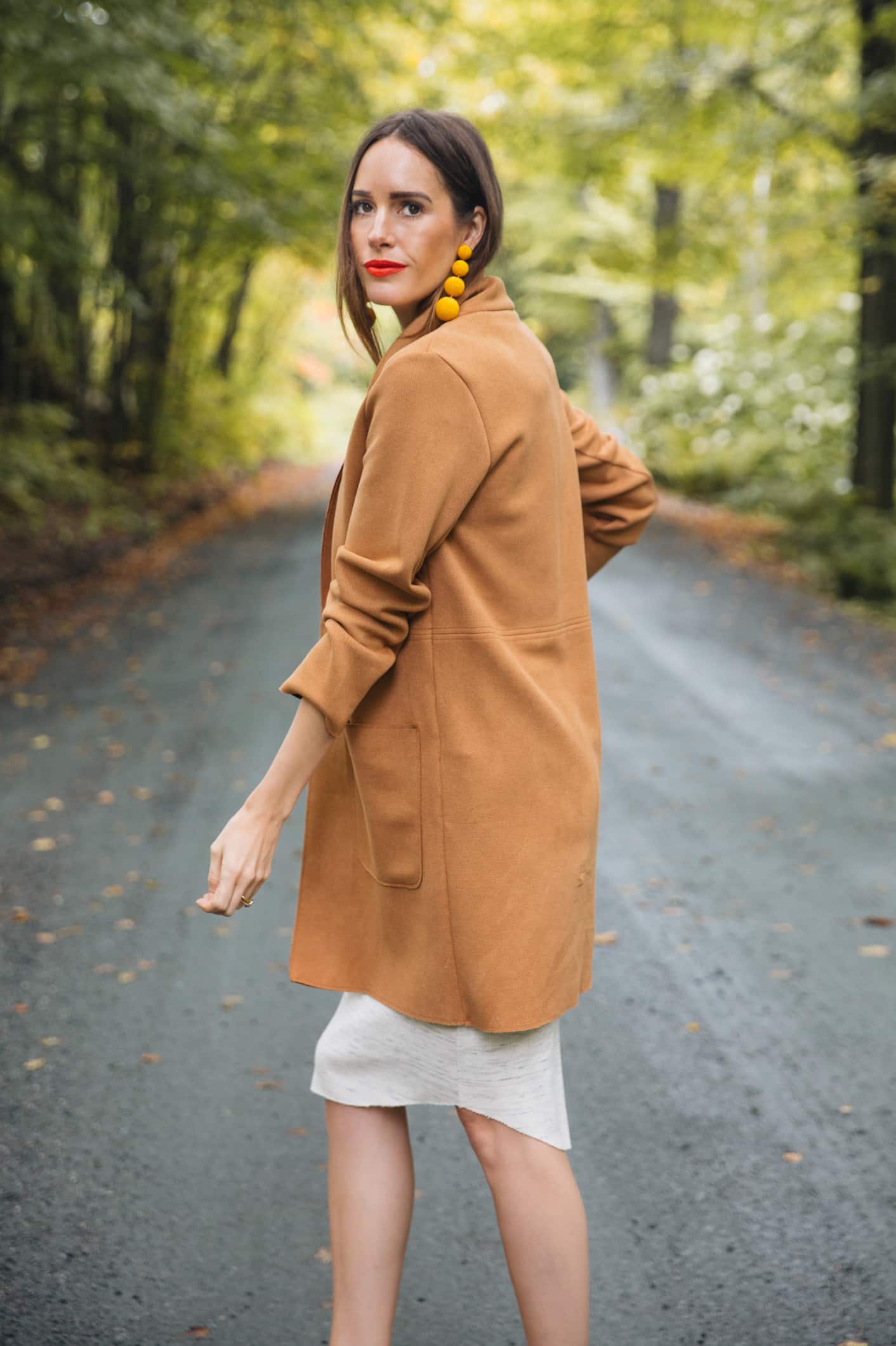 Louise Roe wearing a camel coat for fall in Vermont