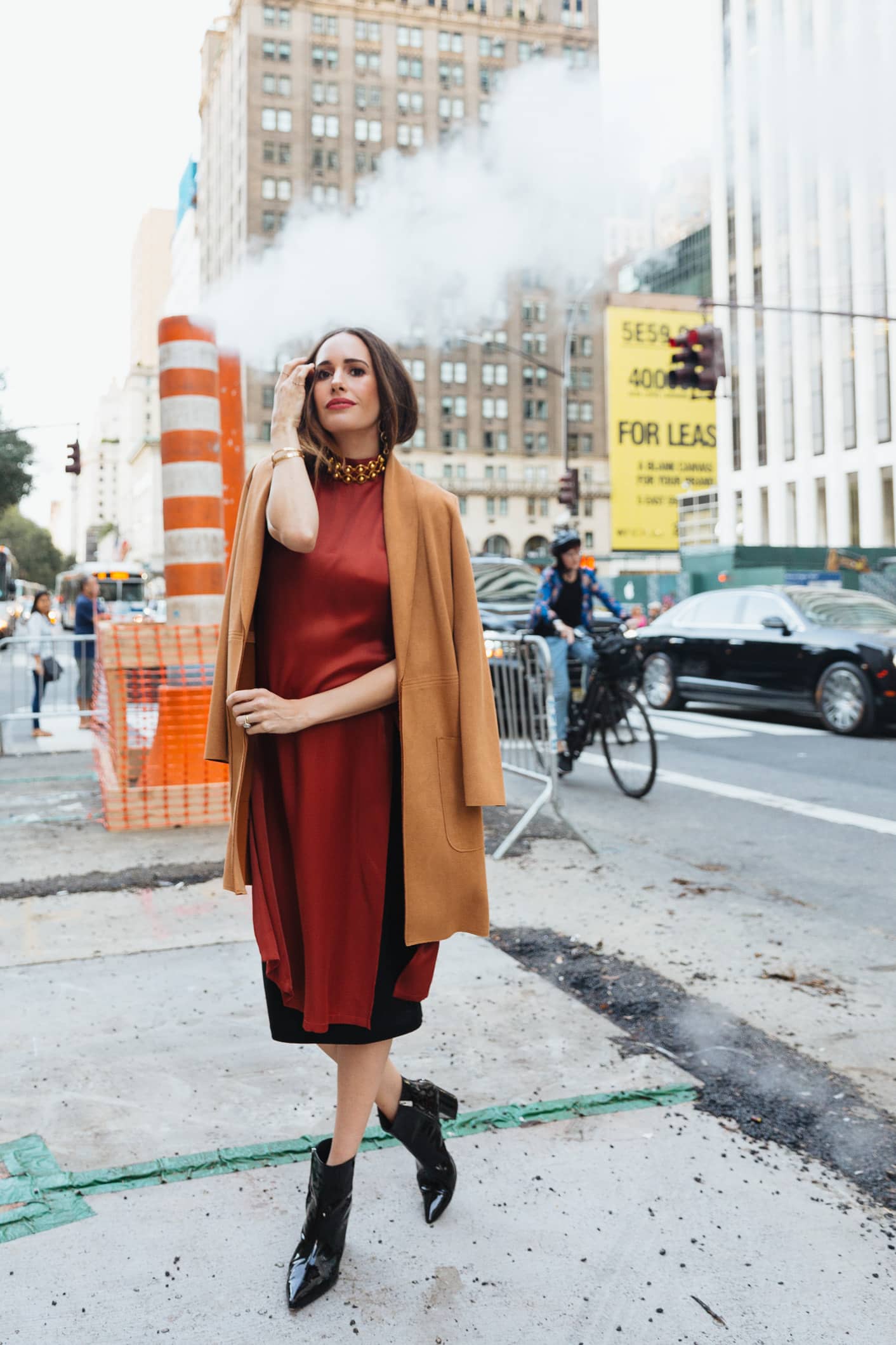 Louise Roe wearing copper tunic at NYFW