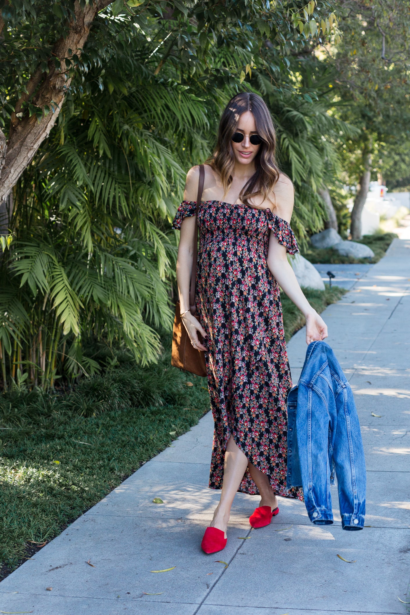 Louise Roe wearing a maxi dress and denim jacket for Fall