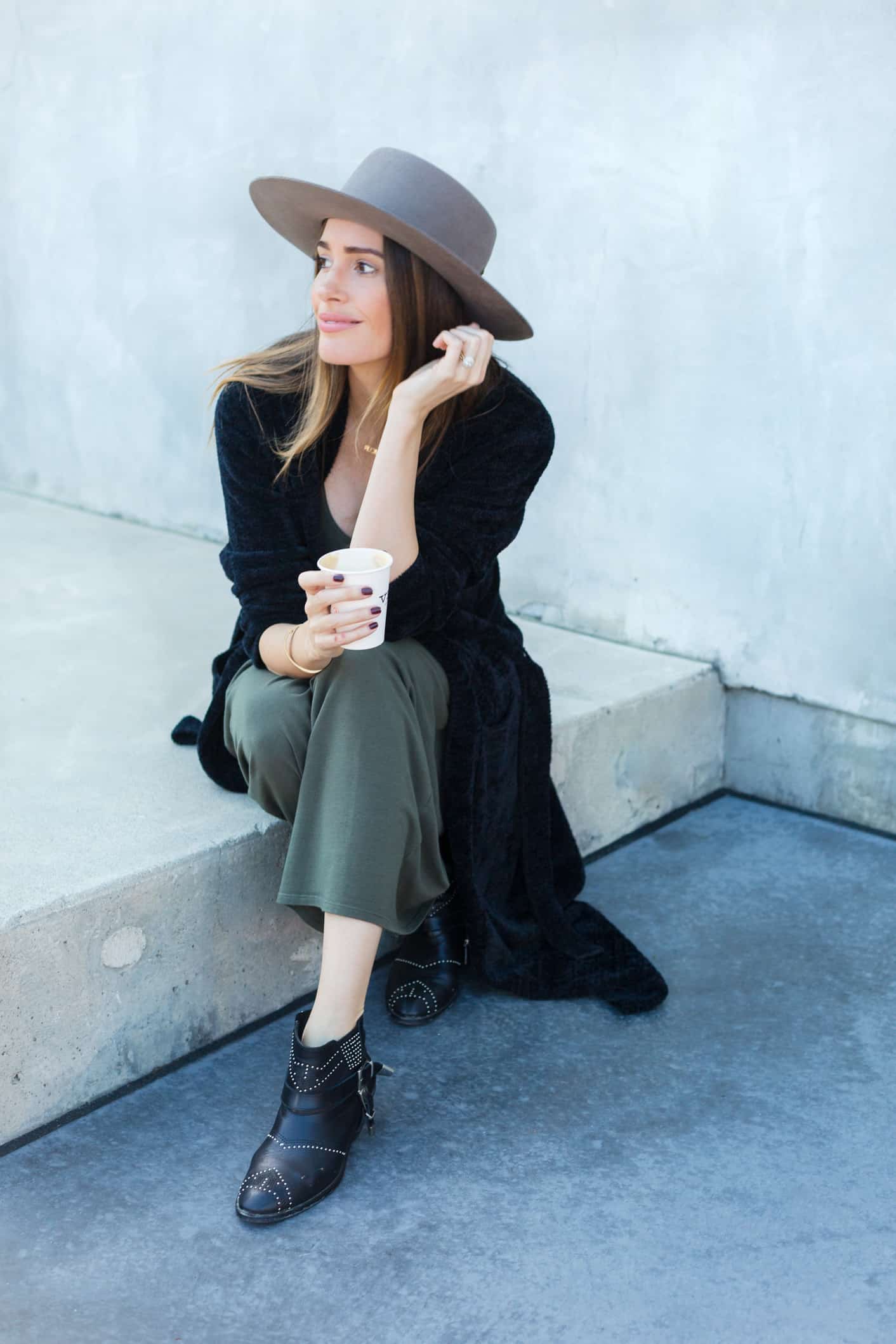 Louise Roe maternity style featuring studded ankle booties and maxi dress