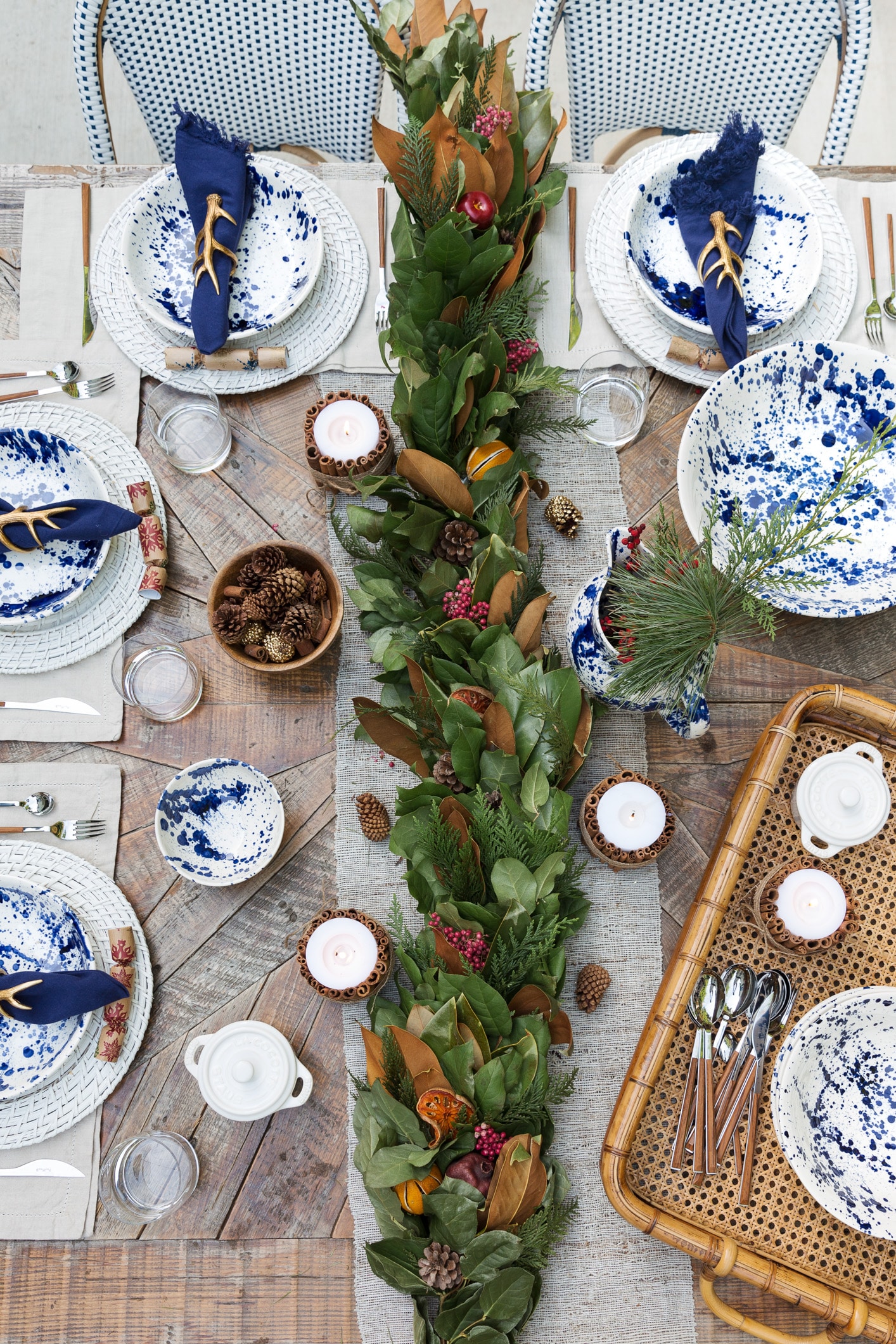 Louise Roe Winter Tablescape With Splatter Paint Dishes And Live Garland