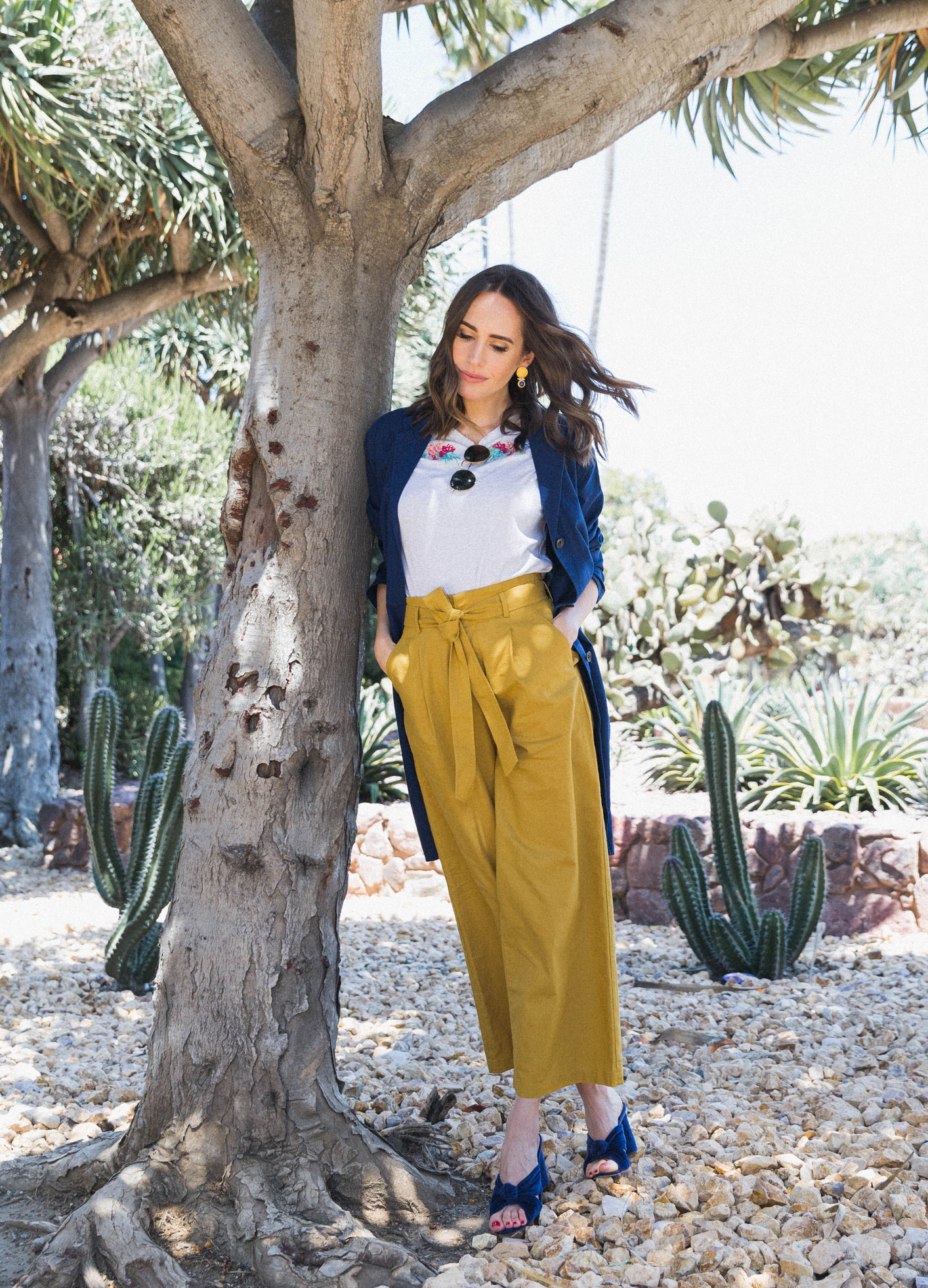 Louise Roe wearing Uniqlo x Sanderson tee mustard trousers cobalt coat and mules for Spring