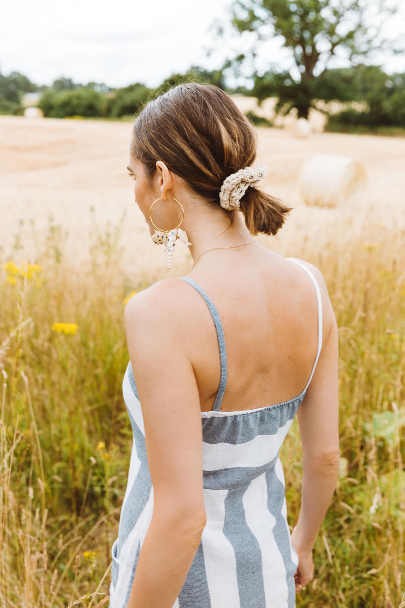 Louise Roe Wearing Summer Trends With Linen Dress Seashell Earrings and Scrunchies