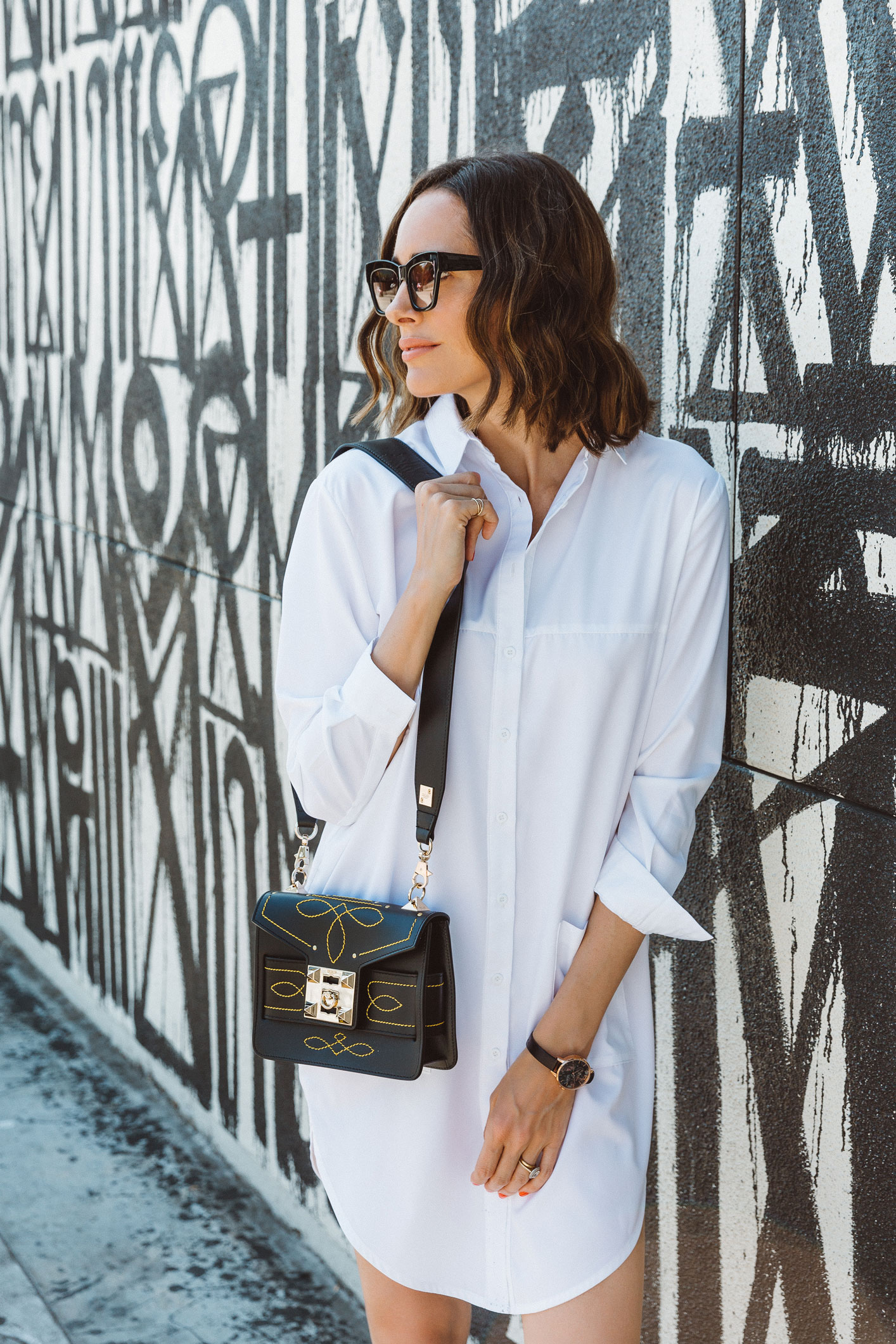 Louise Roe on the psychology of fashion wearing a white shirt dress