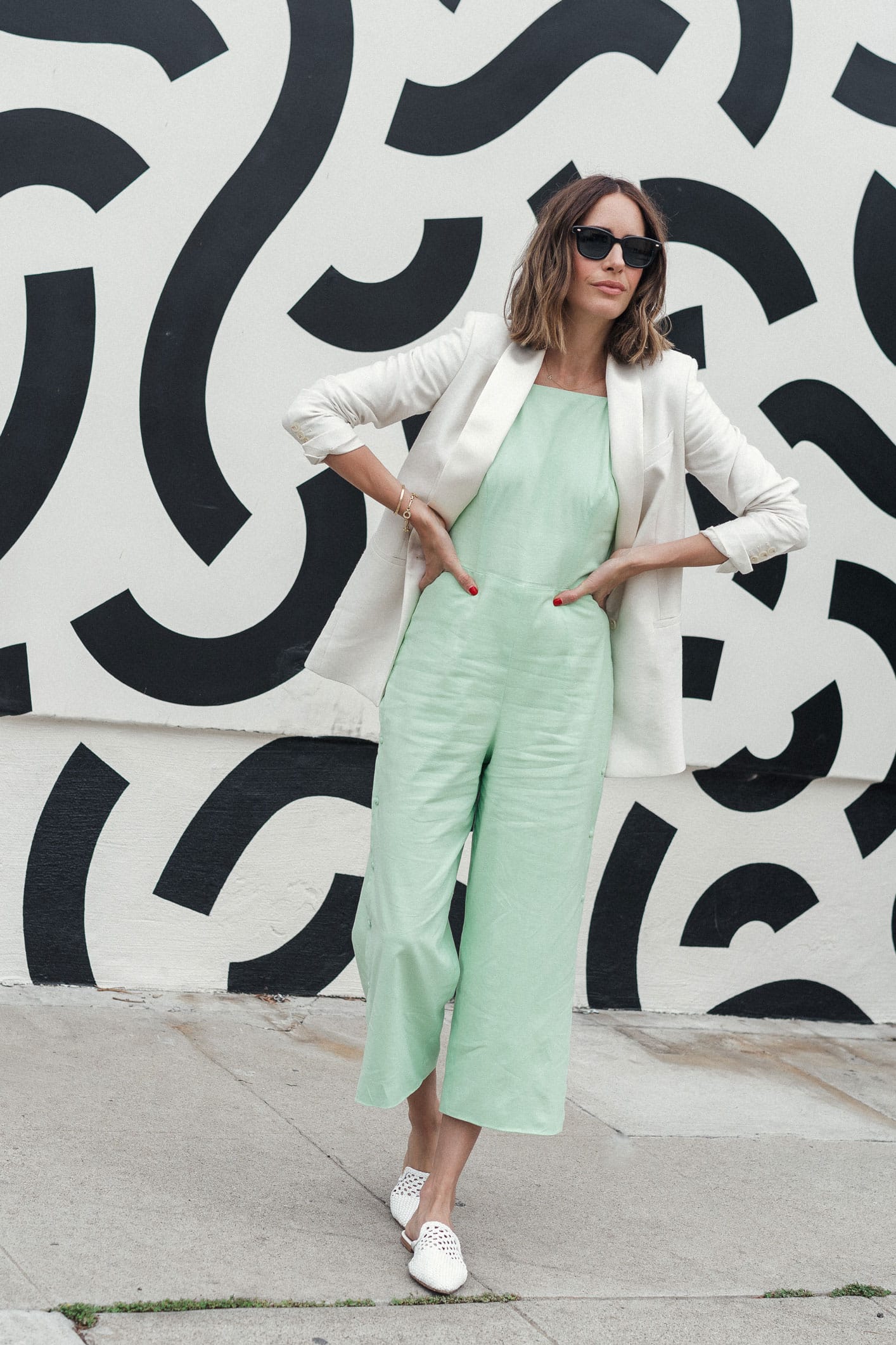 Louise Roe of Front Roe models her top Summer jumpsuit